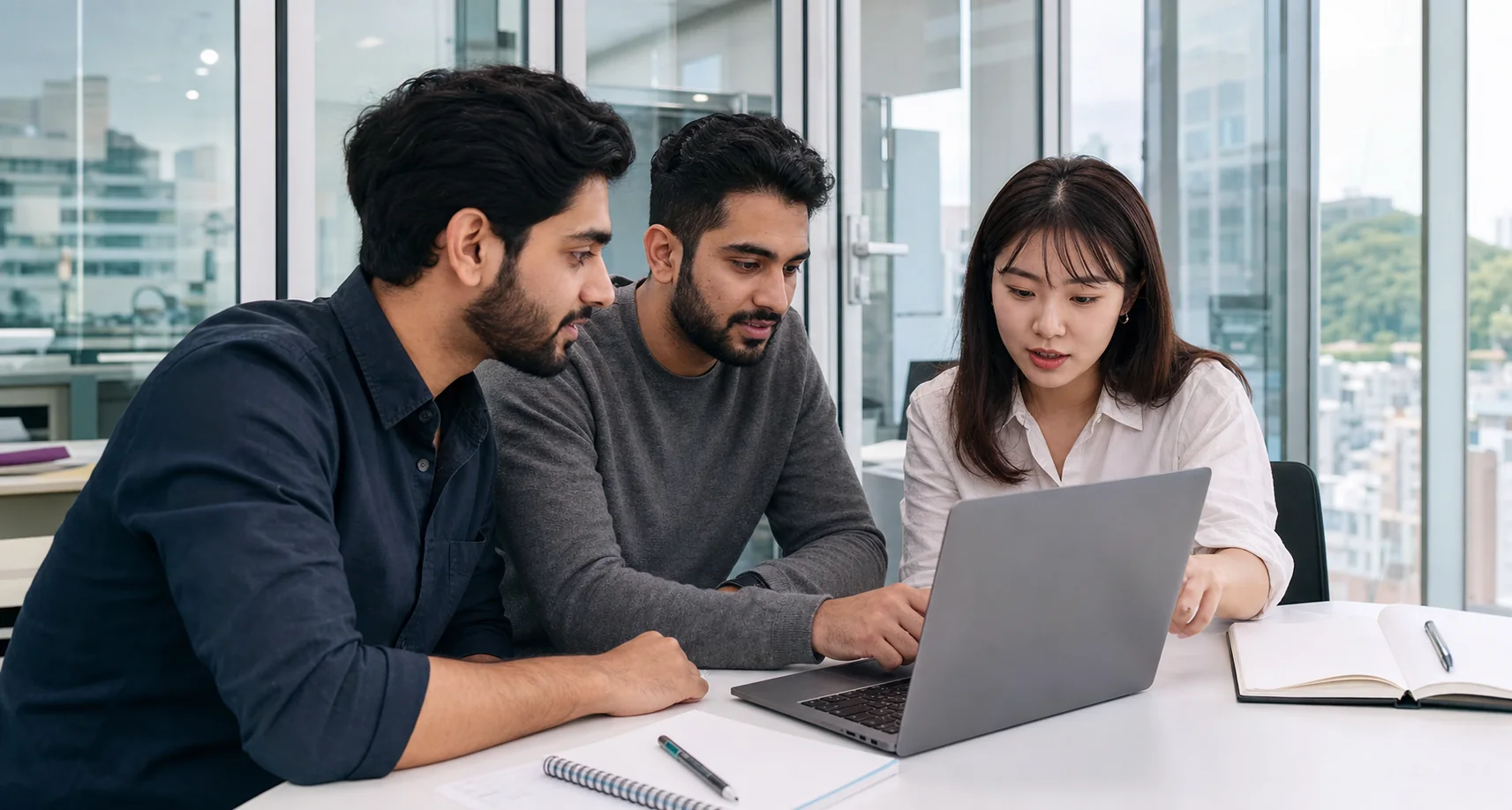 Pakistani students collaborating in a South Korean university research environment